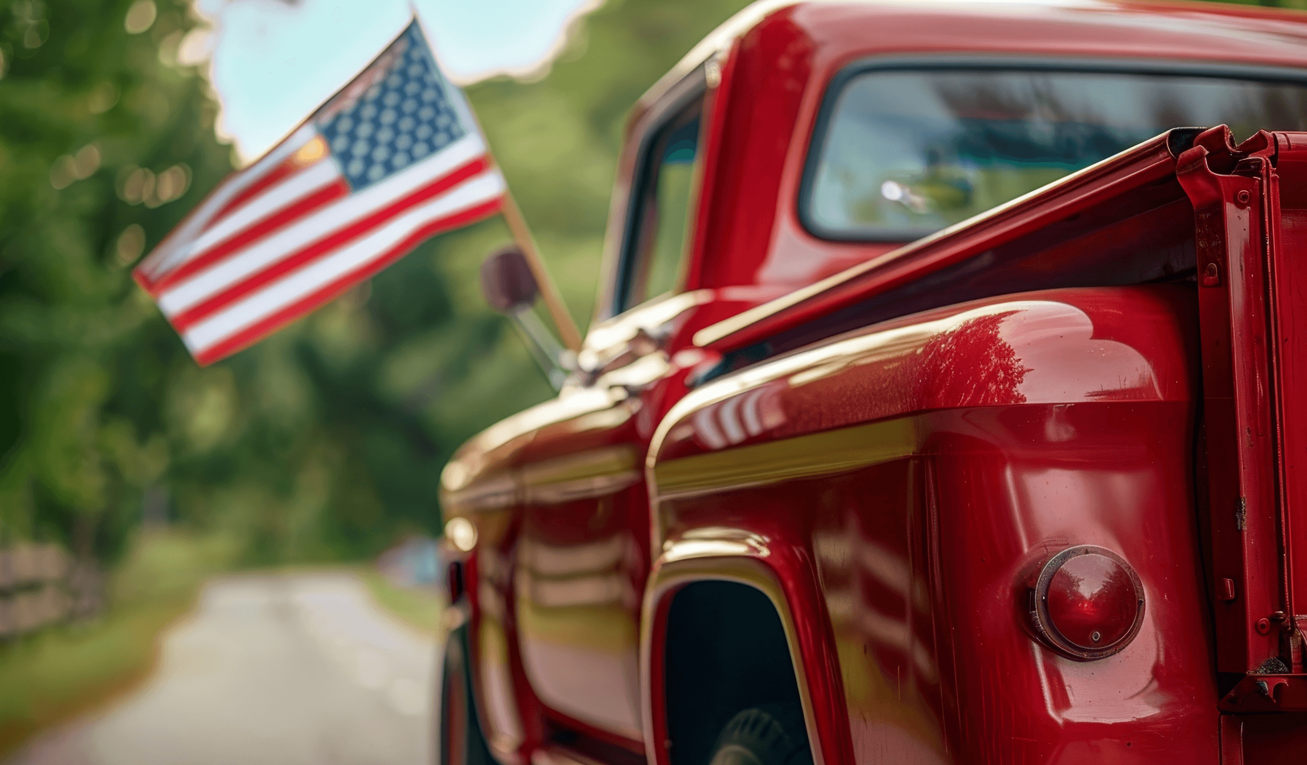A classic pickup truck cared for at Lex's Automotive, chrome trim and an American flag off the mirror
